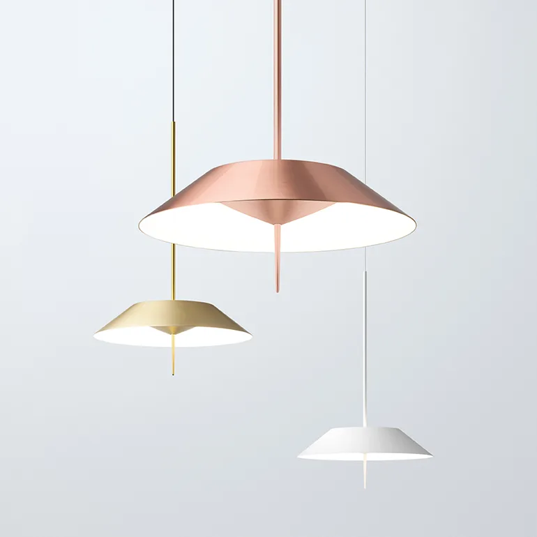 Vibia pendant lamps with copper, gold and white shades